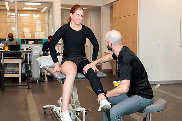 A patient wearing Reparel bioactive fabric technology at UH Drusinsky Sports Medicine Institute